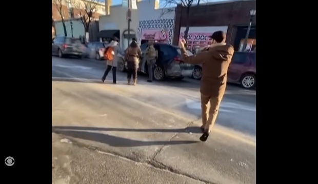 Screen grab showing Alex Pretti directing traffic shortly before the struggle with U.S. Border Patrol.