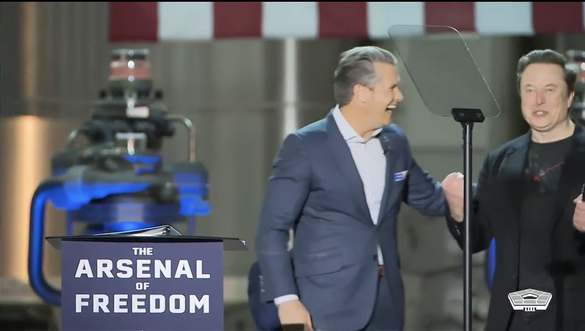 Elon Musk and Defense Secretary Pete Hegseth at SpaceX's Starbase in Texas during the visit referenced in the speech.
