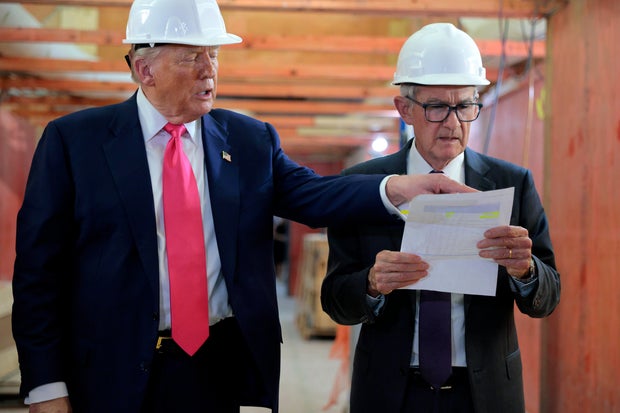 President Donald Trump and Federal Reserve Chair Jerome Powell tour the Fed's headquarters renovation project on July 24, 2025, months before the Fed received subpoenas on the project from the Justice Department.