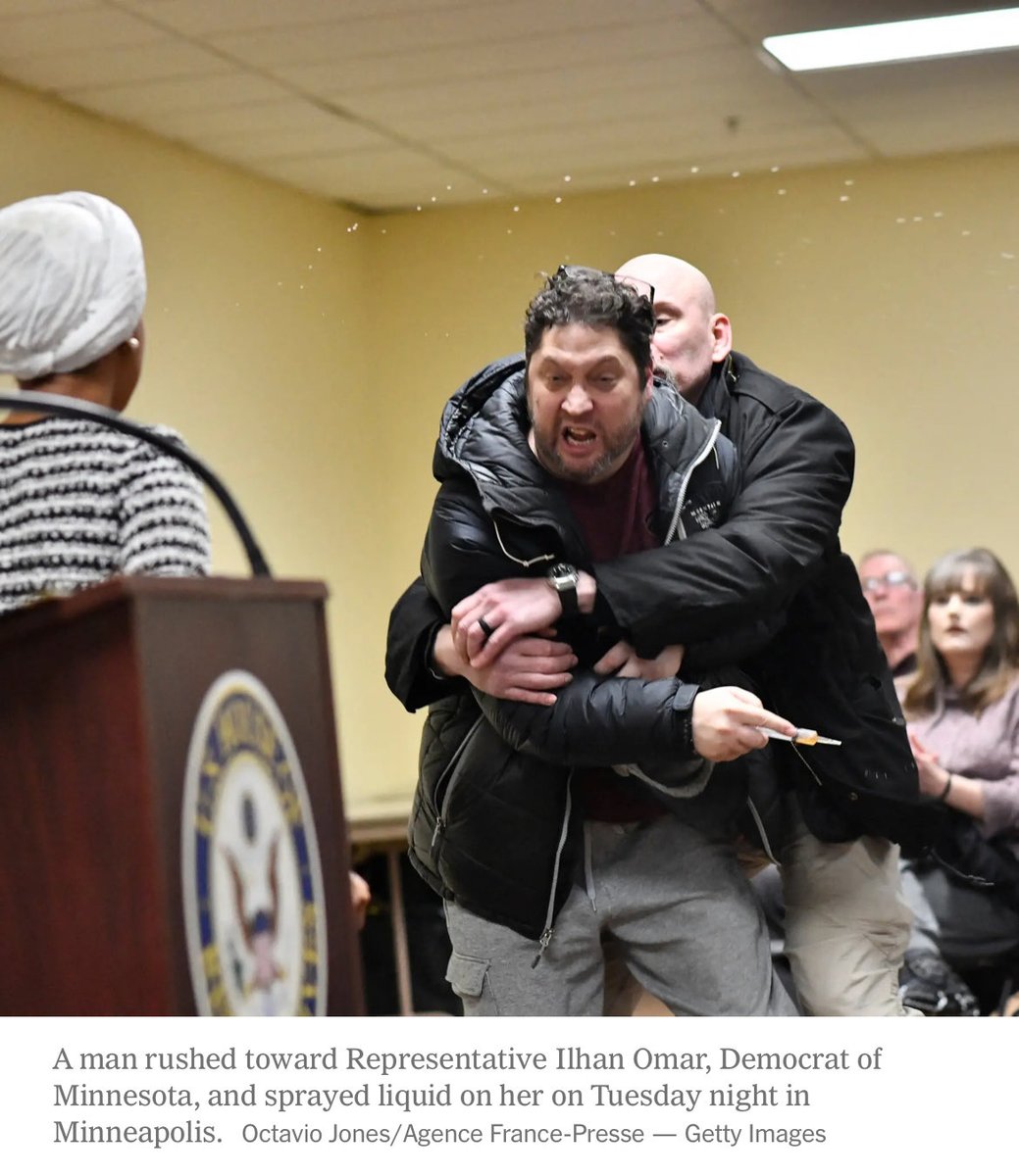 Scene from Rep. Ilhan Omar's Minneapolis town hall as security responds after a man sprayed an unknown liquid.