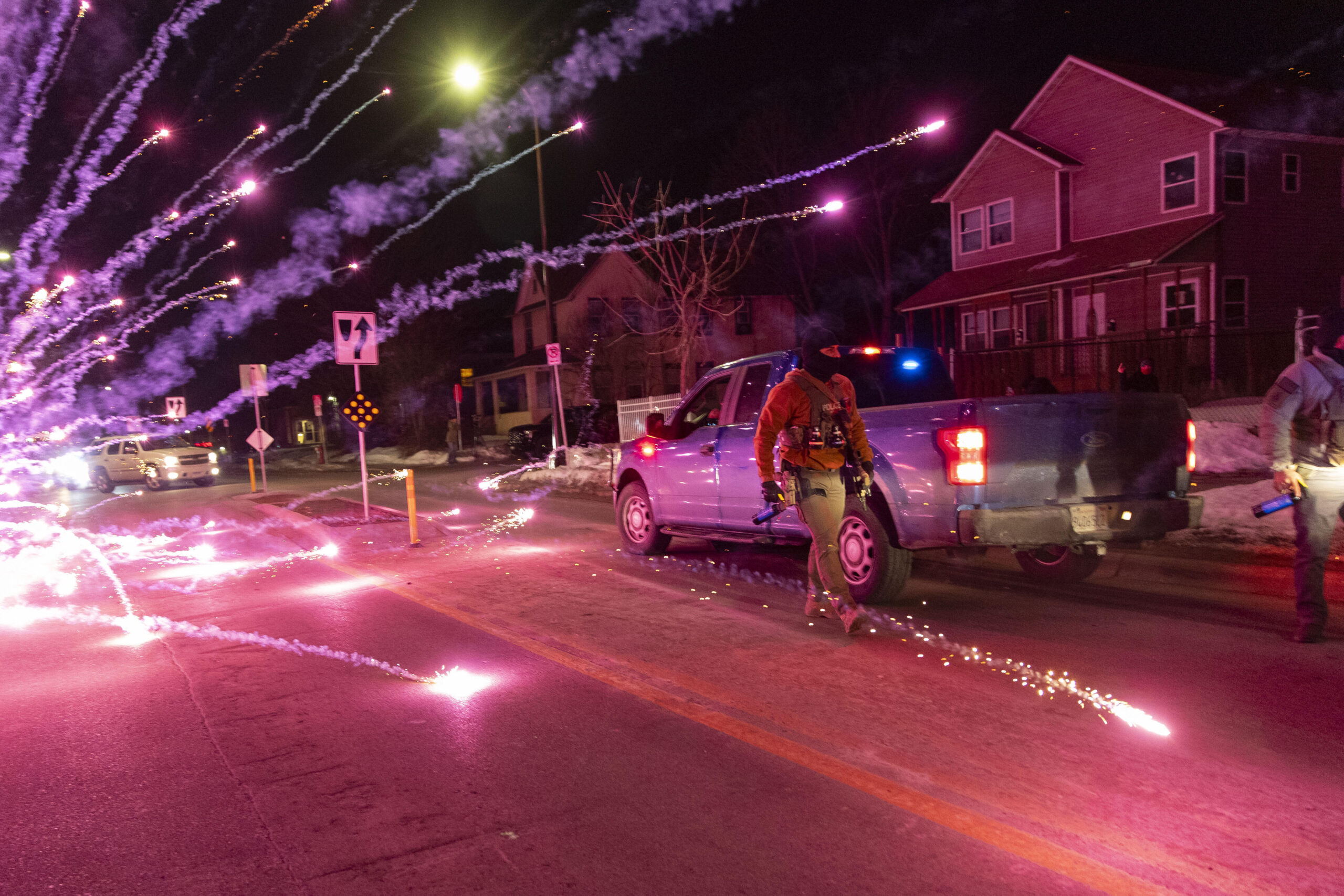 Federal agents deploy tear gas and pepper balls during protests in north Minneapolis on January 14, 2026, following the fatal shooting of Renee Nicole Good by an ICE agent. Photo: Mostafa Bassim/Anadolu via Getty Images.