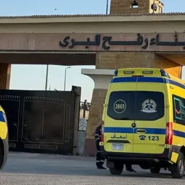 Ambulances waiting at the Egyptian side of the Rafah crossing on Monday morning - bbc