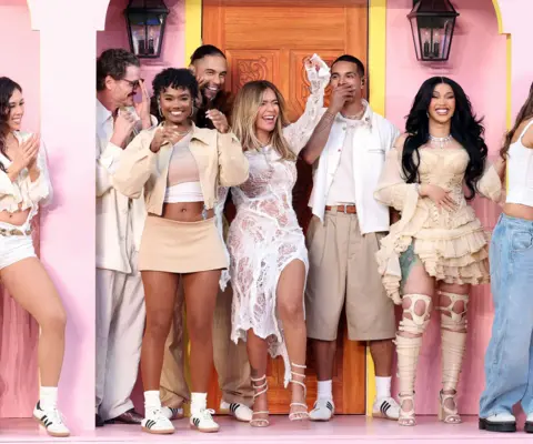 Karol G and Cardi B smile and dance from the casita during the show