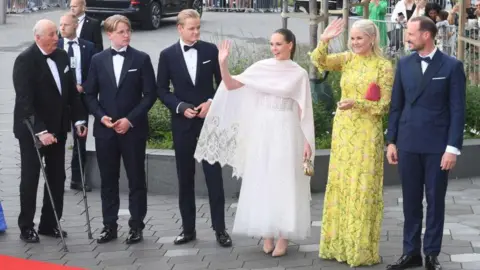 Norwegian royals at a public event, including King Harald, Crown Princess Mette-Marit, Princess Ingrid Alexandra, and Marius Borg Hiby