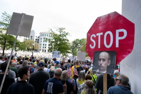 Getty Images Protests in Washington depict an image of Stephen Miller