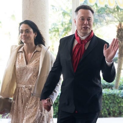Elon Musk, CEO of Tesla and SpaceX, and Shivon Zilis, a venture capitalist, arrive to attend the wedding of Dan Scavino, White House Deputy Chief of Staff, and Erin Elmore, the Department of State Director of Art in Embassies, at President Trump's Mar-a-Lago resort in Palm Beach, Florida, Feb. 1, 2026. - cbs