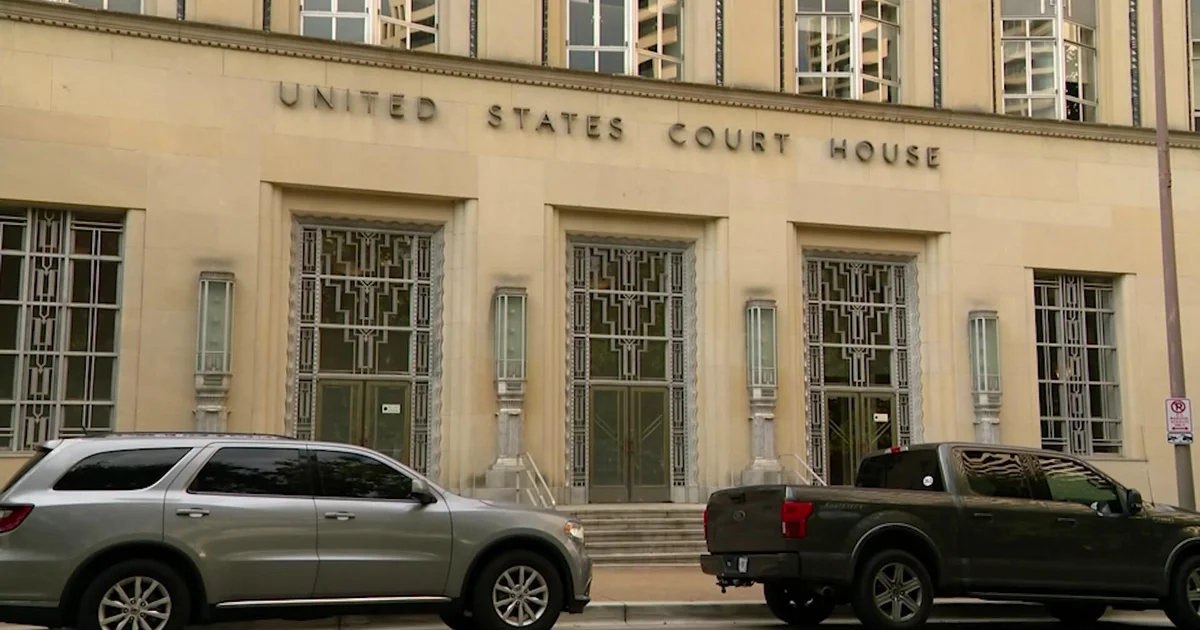Courthouse exterior, representing public hearings and legal scrutiny.