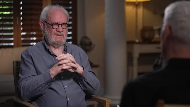 Journalist Max du Preez in a 60 Minutes interview setting.