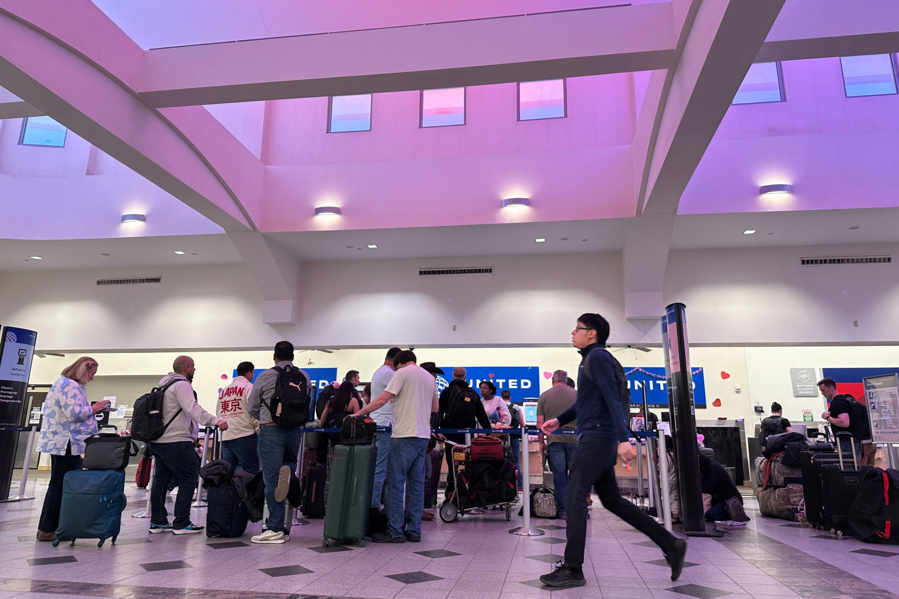 Travelers line up at check-in counters at El Paso International Airport amid the brief shutdown. Photo by Morgan Lee/AP Photo.