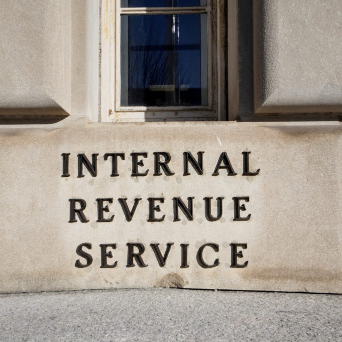 Left: The Internal Revenue Service (IRS) building on Feb. 1, 2026. File photo by Ken Cedeno/ Reuters - pbs