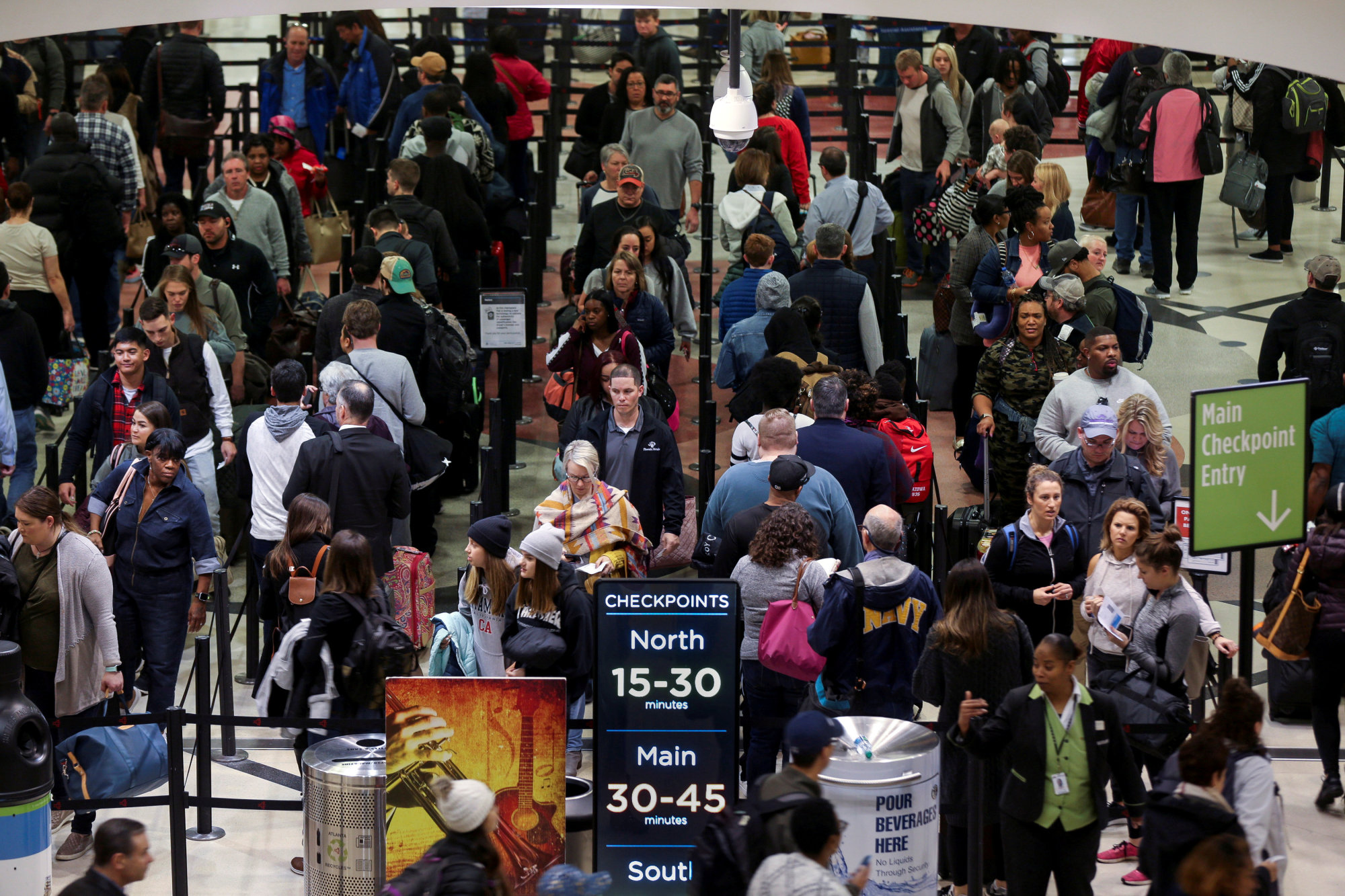 Long lines are seen at a Transportation Security Administration (TSA) security checkpoint at Hartsfield-Jackson Atlanta International Airport amid the partial federal government shutdown, in Atlanta, Georgia, U.S. - REUTERS/Elijah Nouvelage