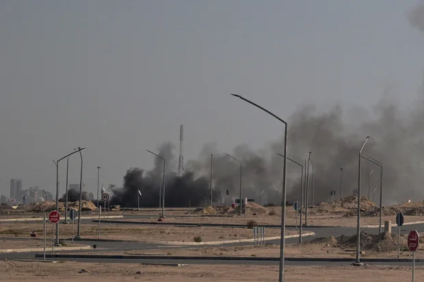 Smoke rises near a U.S.-linked area in Kuwait amid regional strikes