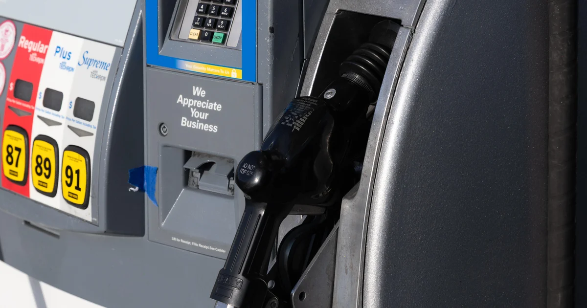 Close-up of pump and nozzle as motorists face higher prices.
