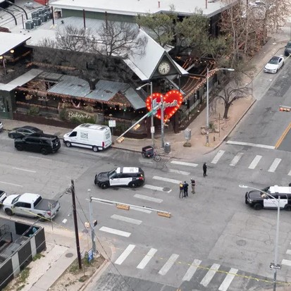 Police investigate the site of a shooting at Buford's in Austin, on Sunday, March 1, 2026. - Aaron E. Martinez/Austin American-Statesman via AP