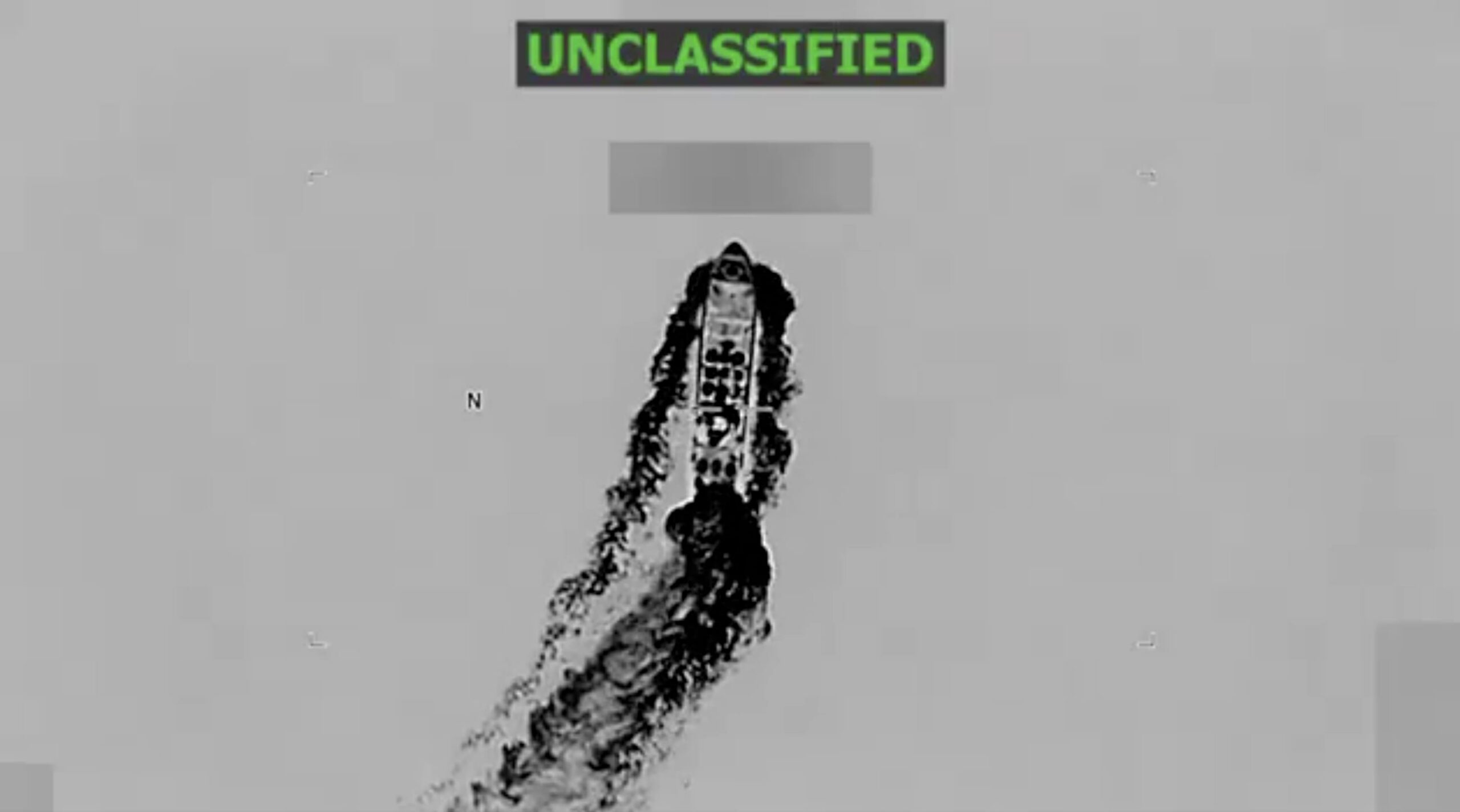 U.S. Southern Command video still shows a small boat moments before a strike in the eastern Pacific.