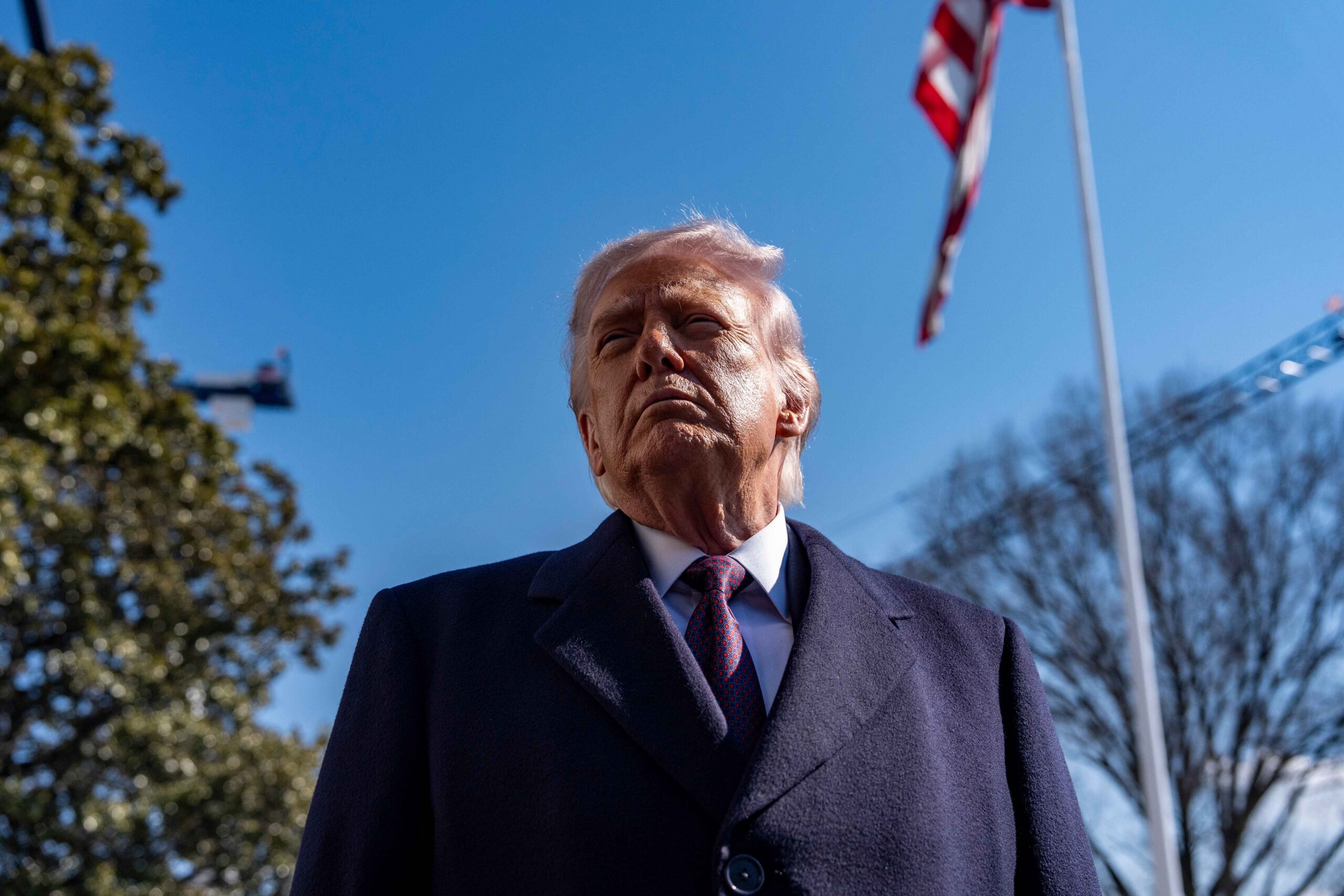 U.S. political figure speaks at an outdoor event, referenced alongside remarks about Operation Epic Fury's expected duration.