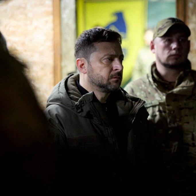 Left: Ukraine's President Volodymyr Zelenskiy and deputy head of his office Brigadier General Pavlo Palisa visit a position of Ukrainian service members in the front line, amid Russia's attack on Ukraine, in Donetsk region, Ukraine March 6, 2026. File photo by Ukrainian Presidential Press Service/Handout via Reuters - Ukrainian Presidential Press Service/Handout via Reuters
