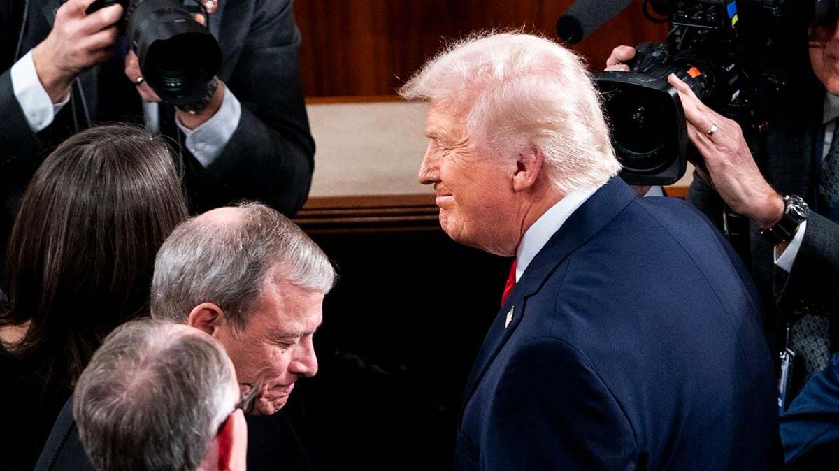 Donald Trump speaks to the press as cameras surround him during shutdown negotiations tied to the SAVE America Act.