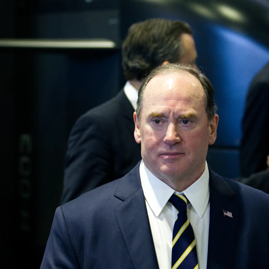 U.S. Navy Secretary John Phelan exits a booth at a defense conference outside Washington, D.C. Photo: Colin Demarest/Axios - Colin Demarest/Axios