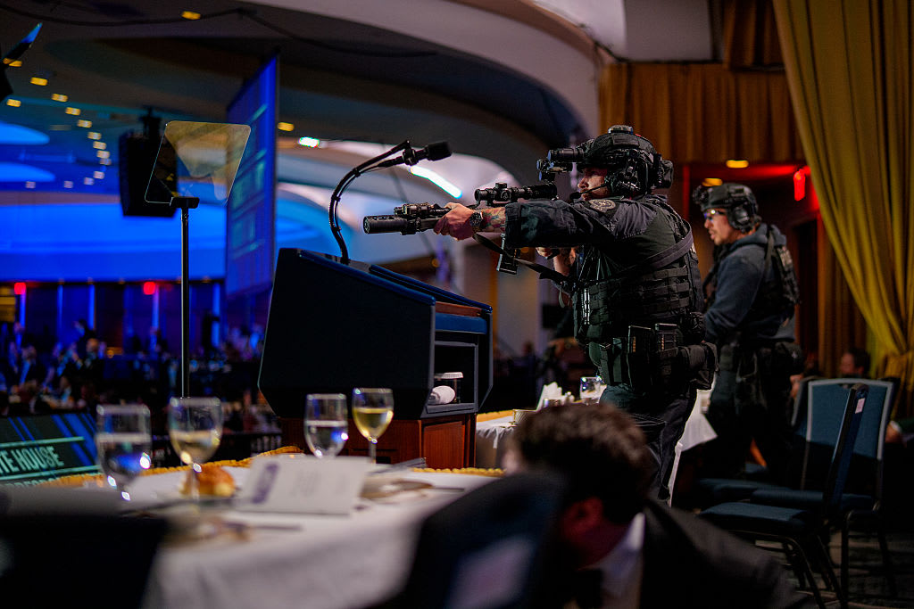 Tactical officers secure the stage area at the Washington Hilton during the White House Correspondents' Dinner.