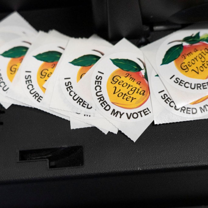 Hero image for PBS NewsHour Georgia runoff story - Alyssa Pointer/Reuters